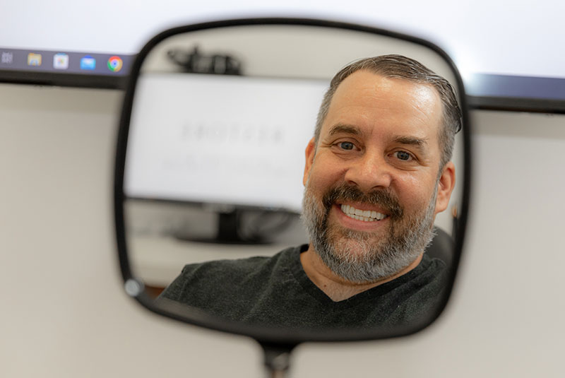 patient smiling confidently after their dental procedure